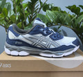 Asics skor